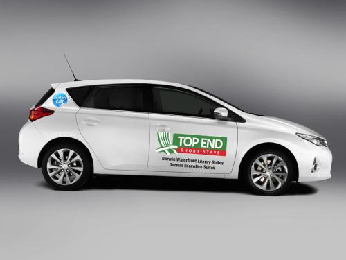 a white car with a top end sticker on it at Darwin Waterfront Luxury Suites in Darwin