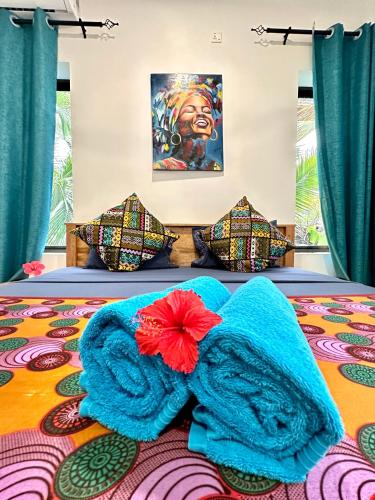 Voodi või voodid majutusasutuse Sand Beach Boutique Hotel toas