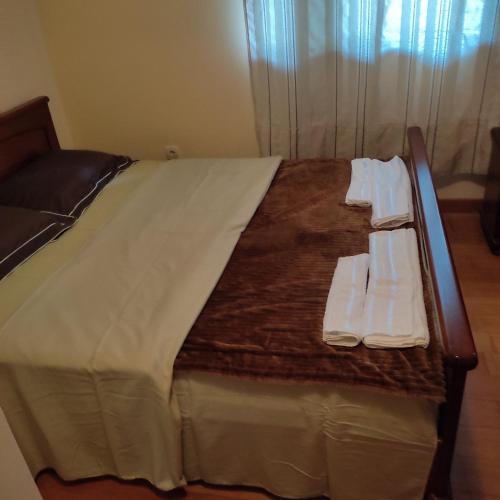 Ένα ή περισσότερα κρεβάτια σε δωμάτιο στο Apartment Bane