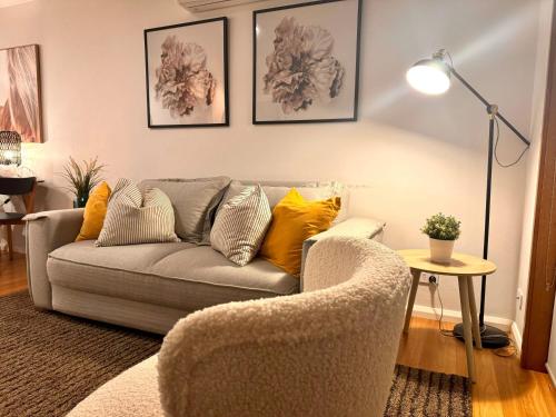 a living room with a couch and a table at 2 Bdrm Apt in Annandale with Courtyard & Parking in Sydney