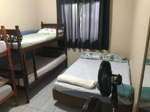 Postel nebo postele na pokoji v ubytování Apartamento beto carreiro , praia