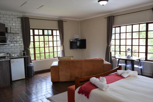 Postel nebo postele na pokoji v ubytování Amber Collection