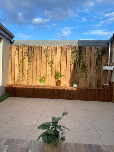 Jardin de l'établissement Maison de ville avec terrasse