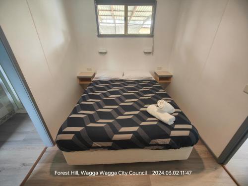 Katil atau katil-katil dalam bilik di Wagga Wagga Tourist Park