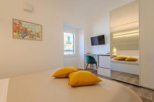 Televiisor ja/või meelelahutuskeskus majutusasutuses Corso Garibaldi 21 Apartment & rooms