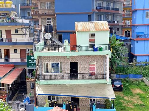 an overhead view of a building with a balcony at Mangal homestay in Pokhara