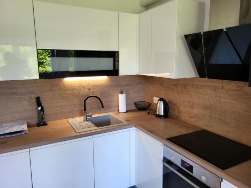 Η κουζίνα ή μικρή κουζίνα στο Bright Apartment