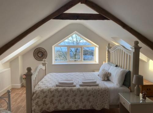 Ліжко або ліжка в номері Pippin Lodge
