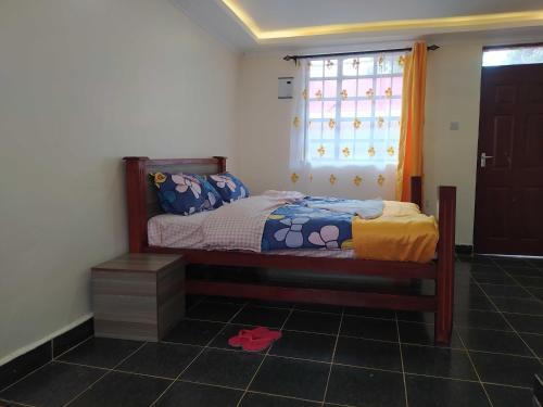 Voodi või voodid majutusasutuse Antonio Accommodation Kericho toas
