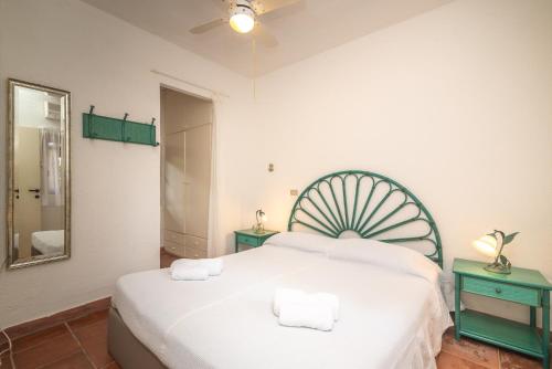 A bed or beds in a room at Villa Ari