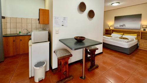 Katil atau katil-katil dalam bilik di Bushbabies-Inn Self-Catering Accommodation