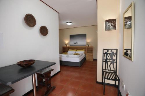 Katil atau katil-katil dalam bilik di Bushbabies-Inn Self-Catering Accommodation