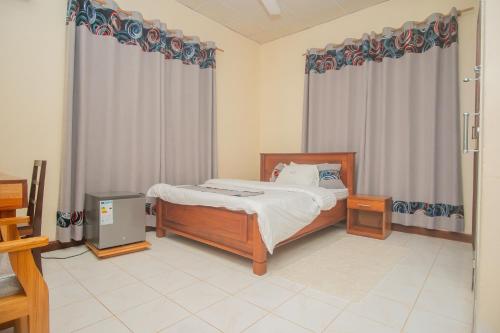 A bed or beds in a room at La Casa Preciosa