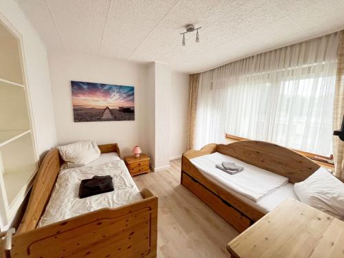 En eller flere senge i et værelse på 5 Room Apartment in Zülpich