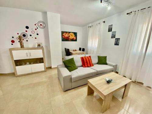 Posezení v ubytování “SMILE NERJA” chic apartment with WIFI, 4 guests