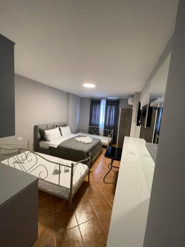Postel nebo postele na pokoji v ubytování Apartament Raci