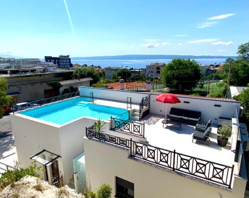 a swimming pool on the roof of a building at Luxury house Prestige - Split in Split