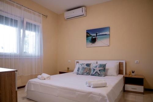 Katil atau katil-katil dalam bilik di Alice's Sea House