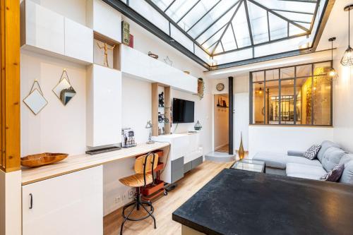 Photo de la galerie de l'établissement GuestReady - Atelier rénové sous verrière à Paris, à Paris