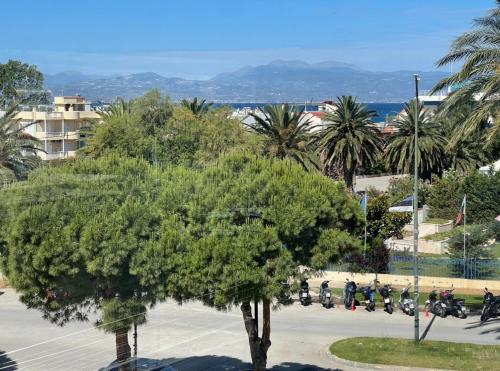 a group of motorcycles parked in a parking lot at Agora Luxury Villa I in Loutraki