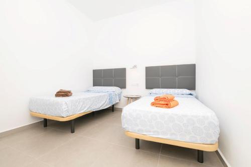 Postel nebo postele na pokoji v ubytování Miamar 2
