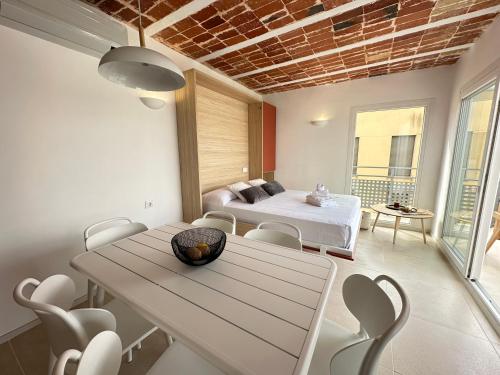 Postel nebo postele na pokoji v ubytování Agi Arago Apartments