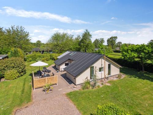 an overhead view of a house with a roof at Holiday Home Kolja - 525m from the sea by Interhome in Neder Lysabild