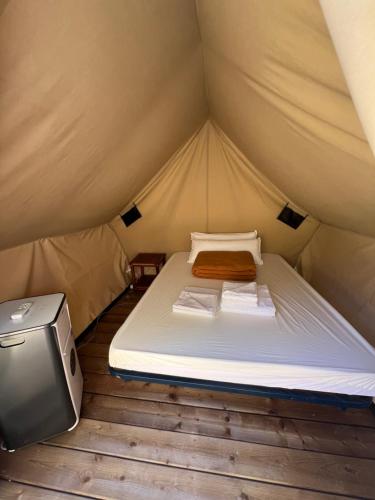 A bed or beds in a room at Camping Igara de San Sebastian
