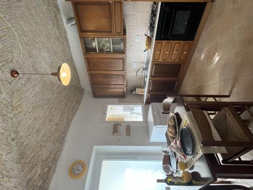 an overhead view of a kitchen with a sink and cabinets at Apartment Marina by Interhome in Dolcedo