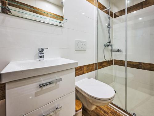 a bathroom with a toilet sink and a shower at Holiday Home JaZ by Interhome in Bedřichov