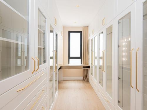 a hallway with glass doors and a window at Villa Šimun by Interhome in Zaton