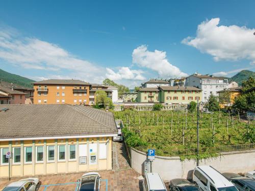 a group of cars parked in a parking lot at Apartment Fruet by Interhome in Pergine Valsugana