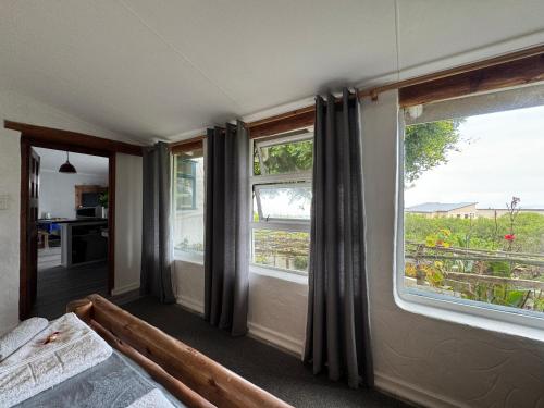 Katil atau katil-katil dalam bilik di Garden Route Self-Catering