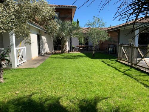 Photo de la galerie de l'établissement Villa familiale aux portes de la Dune du Pilat, à Gujan-Mestras