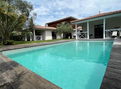 Photo de la galerie de l'établissement Villa familiale aux portes de la Dune du Pilat, à Gujan-Mestras
