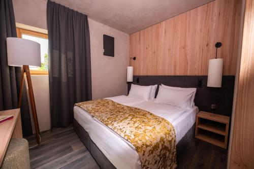 Postel nebo postele na pokoji v ubytování Wine Loft