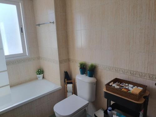 Koupelna v ubytování Apartamento con jardín y piscina Pet friendly