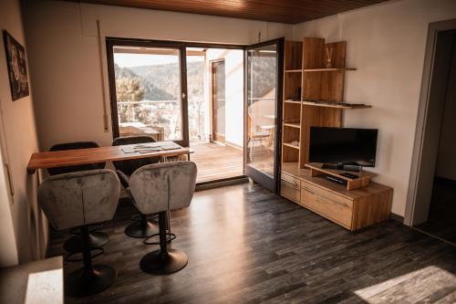 TV a/nebo společenská místnost v ubytování Ferienwohnung-Bali