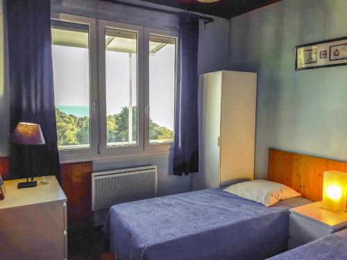 Cama o camas de una habitación en Villa l'Escapade