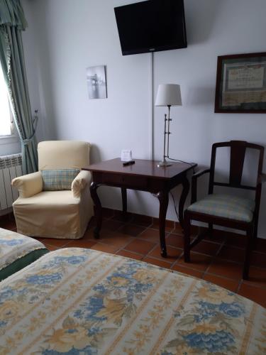 Hotel Los Caspiosにあるテレビまたはエンターテインメントセンター