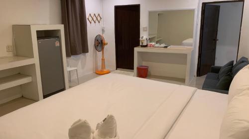 Katil atau katil-katil dalam bilik di Amazing Inn Koh Tao