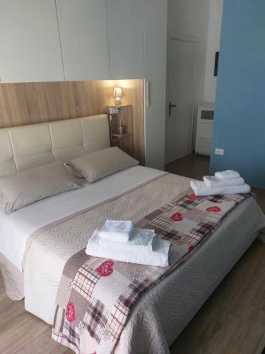 Postel nebo postele na pokoji v ubytování B&B Un posto al Sole