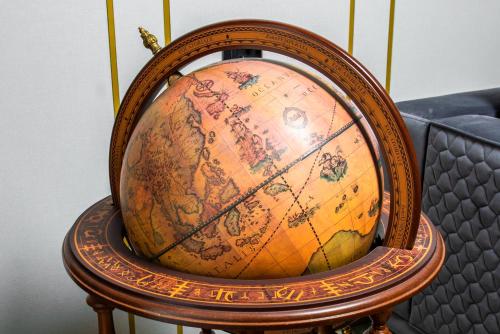 an old globe sitting on top of a table at InterContinental Baku by IHG in Baku