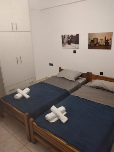 En eller flere senge i et værelse på Izabela's Apartment