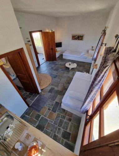 an aerial view of a living room with a bedroom at Fay's View Aegina in Egina