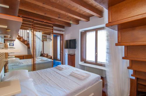 Un ou plusieurs lits dans un hébergement de l'établissement Dimore Verona