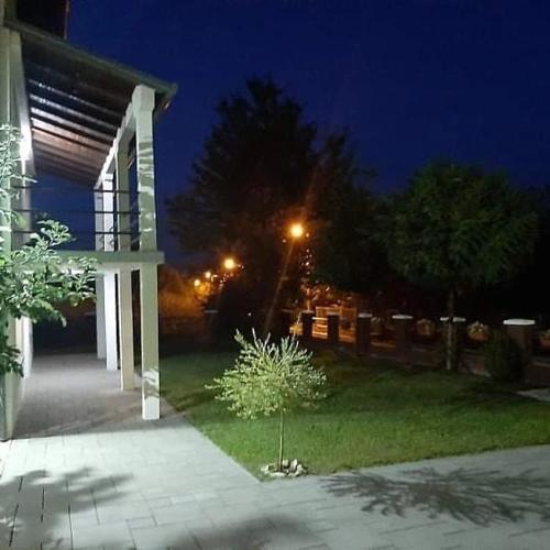 a house yard at night with a street light at Vila Oaza mira in Vražići