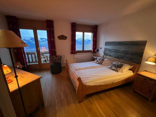 Postel nebo postele na pokoji v ubytování Hôtel Magrappé