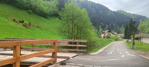 a view of a road with a house on a hill at Haus Lagma Studio in Železniki