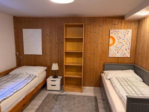 Apartment Reininghaus - Low budget tesisinde bir odada yatak veya yataklar